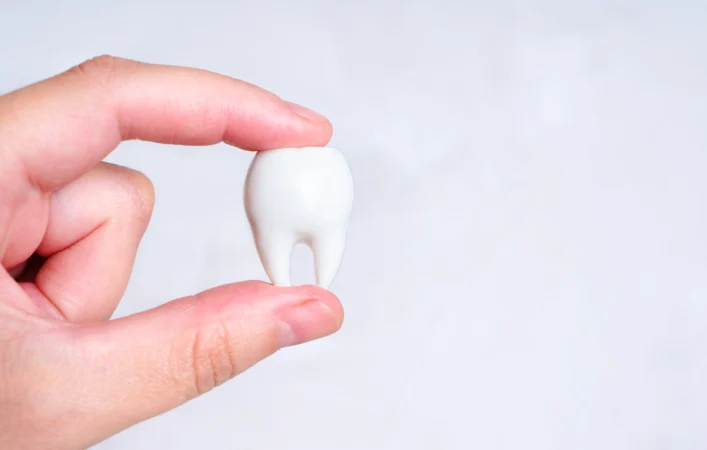 What are the treatment options for missing tooth treatment?